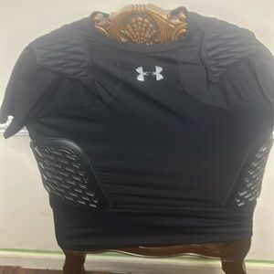 Under armour dri-fit  padded football shirt. Size Large